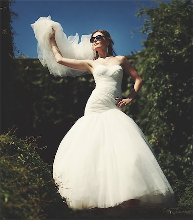 Fashion bride outside. Hot summer day. Wedding picture. Stock Photo - Budget Royalty-Free & Subscription, Code: 400-07311955