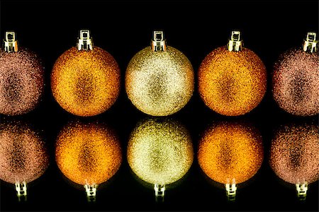 christmas decoration in orange and gold on black background Stock Photo - Budget Royalty-Free & Subscription, Code: 400-07312440