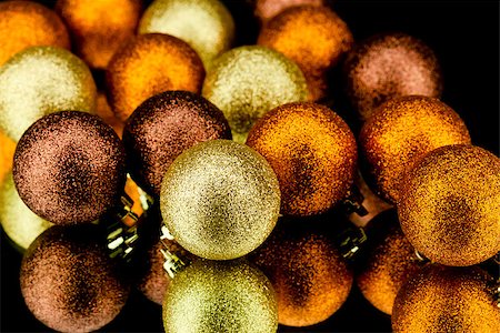 christmas decoration in orange and gold on black background Stock Photo - Budget Royalty-Free & Subscription, Code: 400-07312443