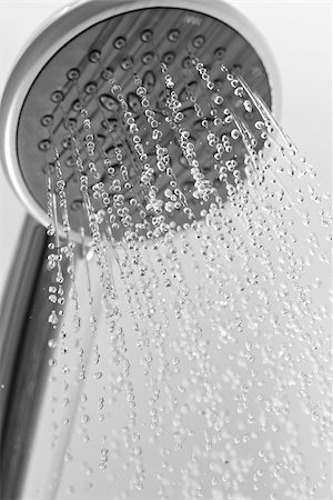 Shower head drops and streams of water. Blue toned. Fotografie stock - Microstock e Abbonamento, Codice: 400-07312497