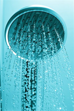 Shower head drops and streams of water. Blue toned. Fotografie stock - Microstock e Abbonamento, Codice: 400-07312498