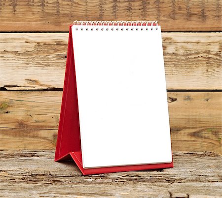 desk calendar on old wooden table Fotografie stock - Microstock e Abbonamento, Codice: 400-07313048