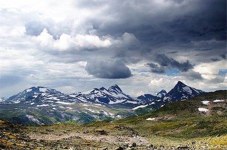 Cloudy mountain scenery in Jotunheimen National Park in Norway Foto de stock - Royalty-Free Super Valor e Assinatura, Número: 400-07313716