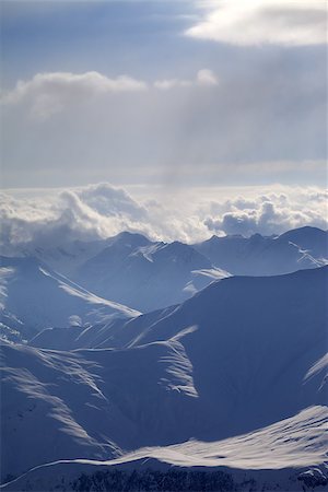 simsearch:400-07211845,k - Winter mountains in evening haze. Caucasus Mountains, Georgia, ski resort Gudauri. Stockbilder - Microstock & Abonnement, Bildnummer: 400-07313726