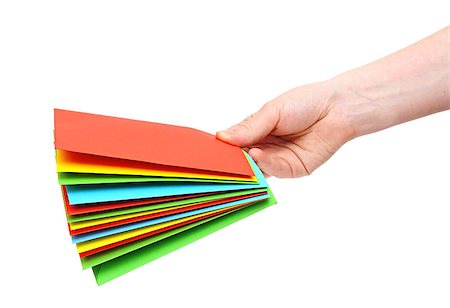 woman hand holding pile colorful envelopes isolated on white Fotografie stock - Microstock e Abbonamento, Codice: 400-07313829