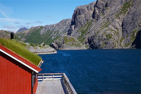 sod roof - Traditional red fishing rorbu hut with sod roof on Lofoten islands in Norway Stock Photo - Budget Royalty-Free & Subscription, Code: 400-07313821