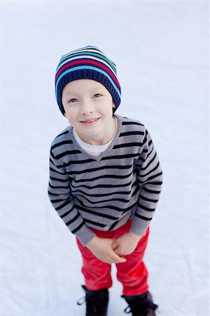 simsearch:400-08318063,k - cute little boy enjoying ice skating Photographie de stock - Aubaine LD & Abonnement, Code: 400-07313871