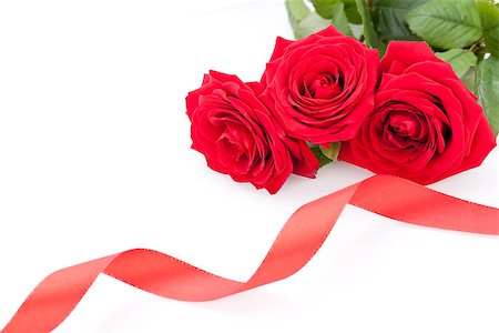 simsearch:689-03124881,k - Bouquet of beautiful fresh red roses with a coiled ribbon border isolated on white with plenty of copyspace for your loving anniversary or Valentines message Stock Photo - Budget Royalty-Free & Subscription, Code: 400-07324003