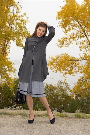 Fashionable young woman with hand bag - outdoor. Stock Photo - Budget Royalty-Free & Subscription, Code: 400-07324232