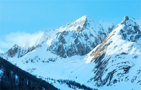 simsearch:400-04012285,k - Winter mountain country landscape with forest on slope (Austria). Stock Photo - Budget Royalty-Free & Subscription, Code: 400-07324659