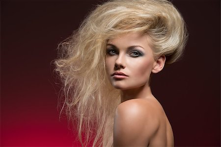 simsearch:400-07223828,k - beauty fashion shoot of sexy woman with naked shoulders, charming bushy creative hair-style and cute make-up Fotografie stock - Microstock e Abbonamento, Codice: 400-07324842