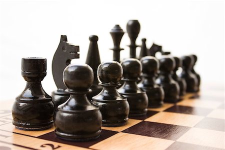 simsearch:400-04398584,k - Chess pieces on a board in different compositions. Fotografie stock - Microstock e Abbonamento, Codice: 400-07325070