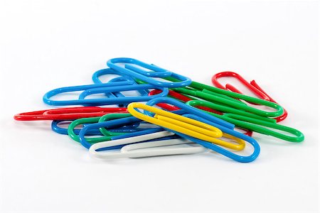 simsearch:400-04833580,k - Paper clips in white background Foto de stock - Super Valor sin royalties y Suscripción, Código: 400-07325202