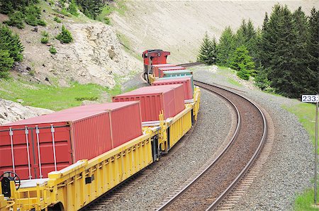 simsearch:400-07417657,k - Freight train in Canadian rockies. Fotografie stock - Microstock e Abbonamento, Codice: 400-07325217