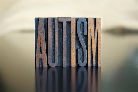 simsearch:400-07325569,k - The word AUTISM written in vintage letterpress type Fotografie stock - Microstock e Abbonamento, Codice: 400-07325564