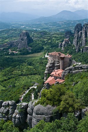 simsearch:400-06696238,k - The Holy Monastery of Rousanou or St. Barbara  is one of Meteora rock pillars in Greece. This is good combination of ancient architecture and rich landscape. Fotografie stock - Microstock e Abbonamento, Codice: 400-07326001