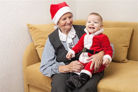 simsearch:400-07329323,k - Baby boy in Santa costume with his great grandmother Foto de stock - Royalty-Free Super Valor e Assinatura, Número: 400-07326159