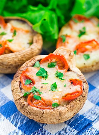 Portobello mushrooms stuffed with mozzarella and cherry tomato Stock Photo - Budget Royalty-Free & Subscription, Code: 400-07326765