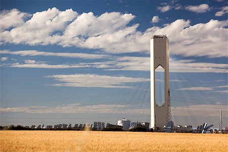 Tower with rays and panels of solar energy in a thermo-solar plant Stock Photo - Budget Royalty-Free & Subscription, Code: 400-07326930