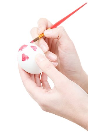 draw close up face - close up of female hands painting white egg with brush isolated on white Stock Photo - Budget Royalty-Free & Subscription, Code: 400-07327380