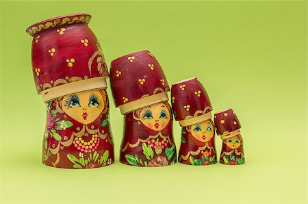 simsearch:400-04986497,k - Red russian wooden nesting dolls wearing their bottom as a hat Foto de stock - Royalty-Free Super Valor e Assinatura, Número: 400-07328030