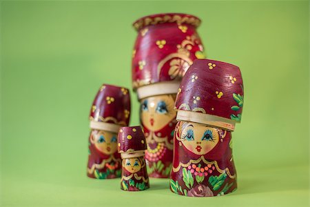 simsearch:400-04986497,k - Red russian wooden nesting dolls wearing their bottom as a hat Foto de stock - Royalty-Free Super Valor e Assinatura, Número: 400-07328031