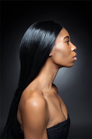 simsearch:400-06179308,k - Beautiful young black woman with long straight hair Stock Photo - Budget Royalty-Free & Subscription, Code: 400-07328376