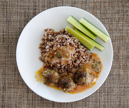 porage - Buckwheat with small meat balls, red souse and fresh cucumbers Stock Photo - Budget Royalty-Free & Subscription, Code: 400-07328401