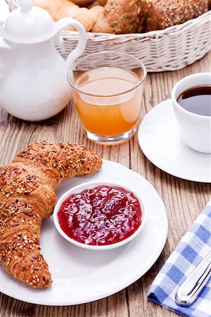 healthy french breakfast coffee croissant on wooden table Fotografie stock - Microstock e Abbonamento, Codice: 400-07328468