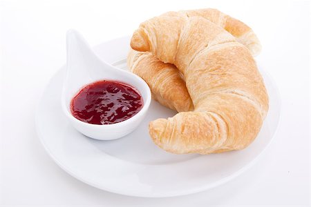 simsearch:400-05387533,k - deliscios fresh croissant with strawberry jam isolated on white background Stock Photo - Budget Royalty-Free & Subscription, Code: 400-07328563