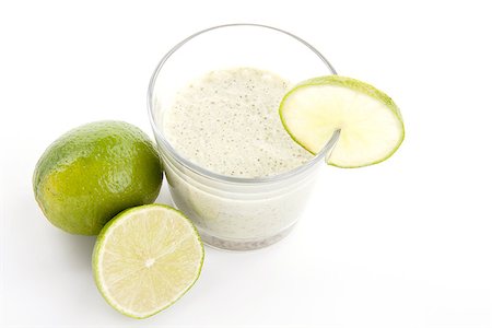 fresh tasty lime citrus yoghurt shake dessert isolated on white background Stock Photo - Budget Royalty-Free & Subscription, Code: 400-07328596