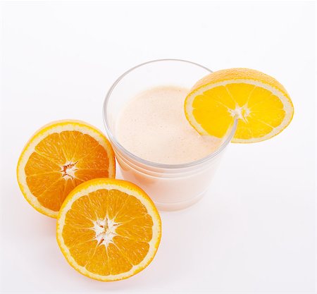 simsearch:400-08494395,k - fresh tasty orange yoghurt shake dessert isolated on white background Foto de stock - Super Valor sin royalties y Suscripción, Código: 400-07328603
