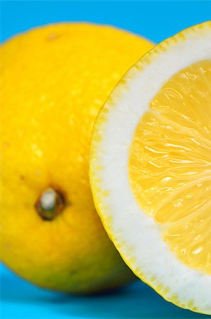 simsearch:400-03931888,k - Fresh lemon citrus isolated on blue background, close-up Stock Photo - Budget Royalty-Free & Subscription, Code: 400-07329204