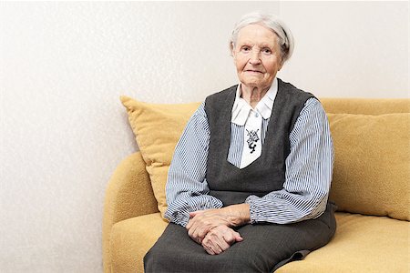 Portrait of a senior woman looking at the camera. Stock Photo - Budget Royalty-Free & Subscription, Code: 400-07329319