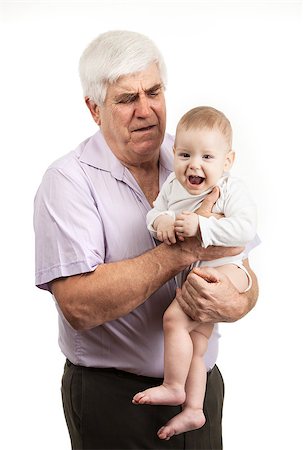 simsearch:400-04374126,k - Portrait of a mature grandfather holding grandson over white Foto de stock - Super Valor sin royalties y Suscripción, Código: 400-07329338
