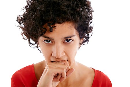 envy hands - hispanic frustrated woman biting fingers, angry, looking at camera Stock Photo - Budget Royalty-Free & Subscription, Code: 400-07329606