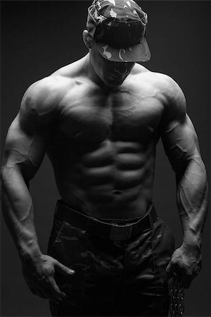 fitness model adult - The beautiful and strong young guy Stock Photo - Budget Royalty-Free & Subscription, Code: 400-07329917