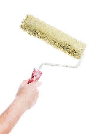 simsearch:400-05700794,k - Hand holding paint roller isolated on a white background Stock Photo - Budget Royalty-Free & Subscription, Code: 400-07329938
