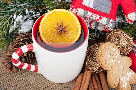 Christmas mulled wine with fir tree, gingerbread and decor on wooden table Stock Photo - Budget Royalty-Free & Subscription, Code: 400-07320159