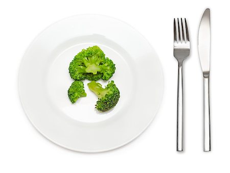 simsearch:400-07976764,k - Boiled broccoli on white plate with knife and fork isolated onwhite background. Photographie de stock - Aubaine LD & Abonnement, Code: 400-07321242