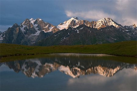 simsearch:400-07325218,k - This is reflections on the mountain lake near Mestia - Caucasus mountains, Georgia, altitude 3000m. Photographie de stock - Aubaine LD & Abonnement, Code: 400-07321277