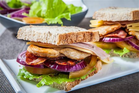 fresh chicken salad - chicken breast sandwich with bacon ham and vegetables Stock Photo - Budget Royalty-Free & Subscription, Code: 400-07321867