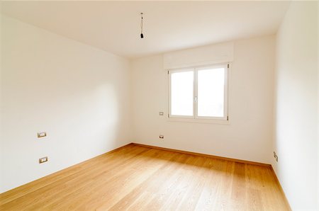 Spacious empty room with white walls, window and parquet floor Foto de stock - Super Valor sin royalties y Suscripción, Código: 400-07322272