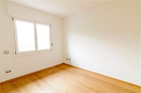 Spacious empty room with white walls, window and parquet floor Foto de stock - Super Valor sin royalties y Suscripción, Código: 400-07322273