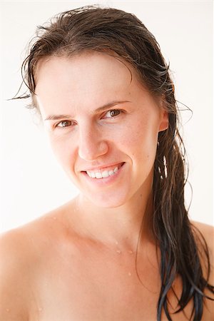 portrait of beautiful woman after shower smiling looking at camera Stock Photo - Budget Royalty-Free & Subscription, Code: 400-07322745