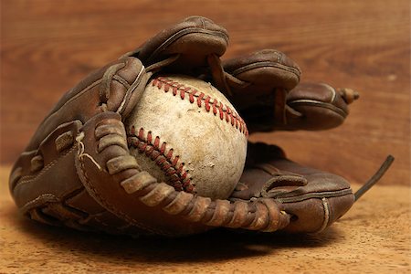 simsearch:400-04673387,k - An old baseball inside a well used glove. Stock Photo - Budget Royalty-Free & Subscription, Code: 400-07322905