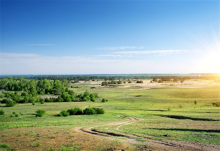 simsearch:400-06867510,k - Country road through the plain at sunrise Stock Photo - Budget Royalty-Free & Subscription, Code: 400-07323037