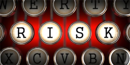 simsearch:400-07308209,k - Risk on Old Typewriter's Keys on Red Background. Stock Photo - Budget Royalty-Free & Subscription, Code: 400-07323313