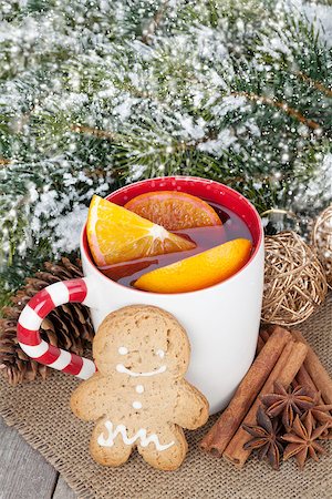 Christmas mulled wine with fir tree, gingerbread and spices on wooden table Stock Photo - Budget Royalty-Free & Subscription, Code: 400-07323801