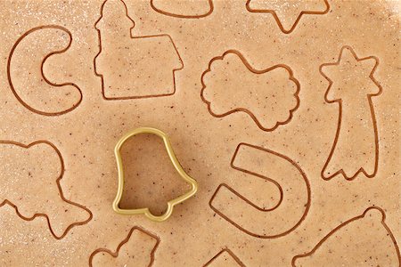 Gingerbread dough for christmas cookies with cookie cutter Stock Photo - Budget Royalty-Free & Subscription, Code: 400-07323811
